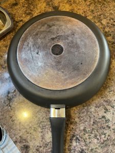 frying pan after cleaning with wood ash paste