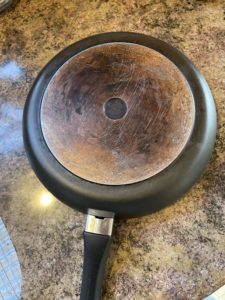 frying pan before cleaning with wood ash paste