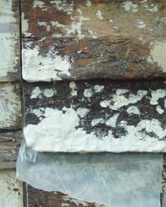 decayed wooden siding treated with an epoxy filler